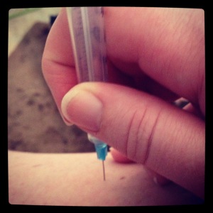 Yes, this is me giving myself a shot in the leg. This is how I've earned my "badass" merit badge. 